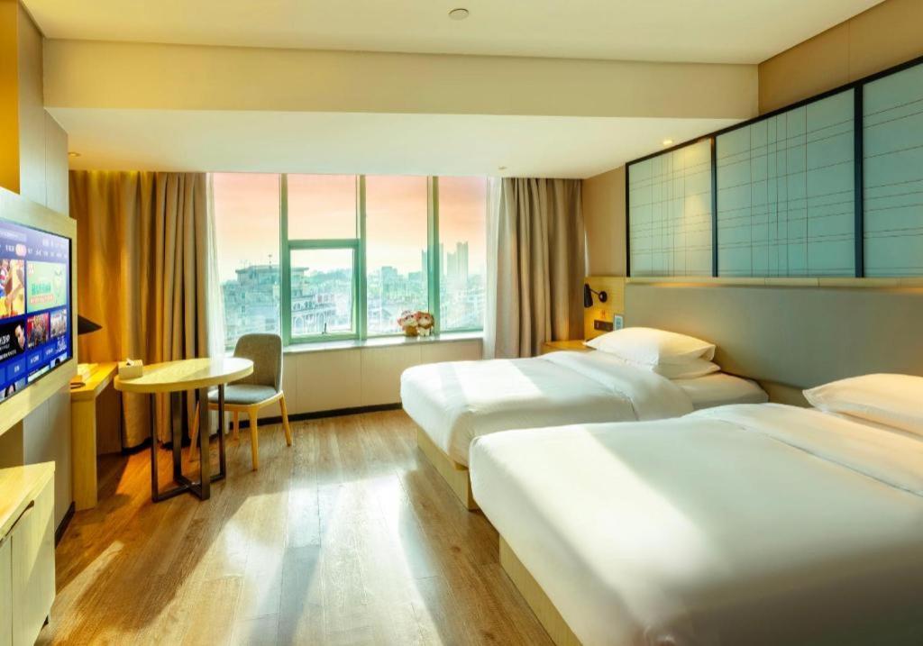 Echarm Hotel Yangjiang Baili Plaza Exterior foto