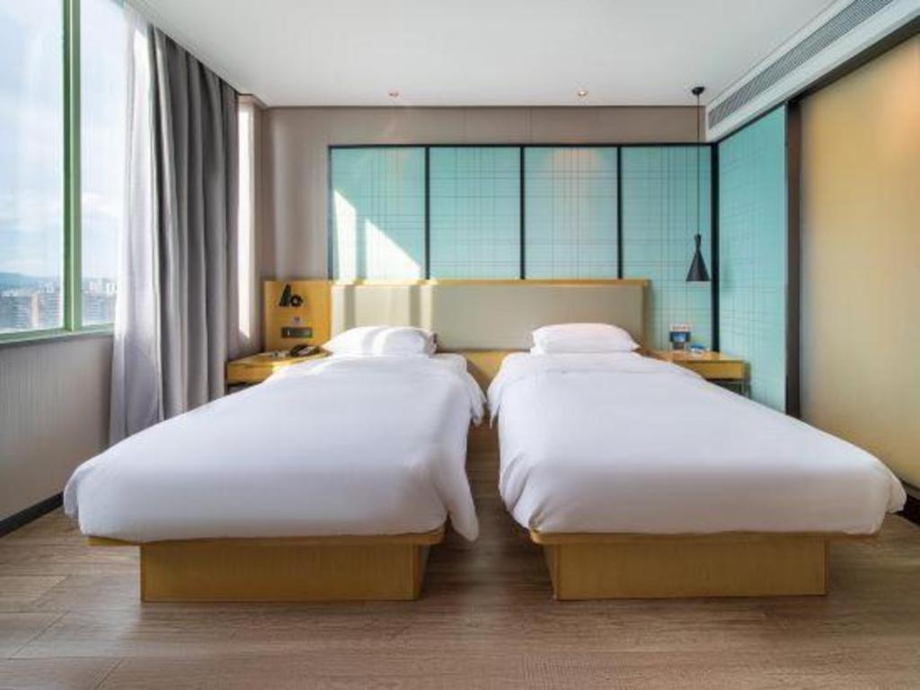 Echarm Hotel Yangjiang Baili Plaza Exterior foto