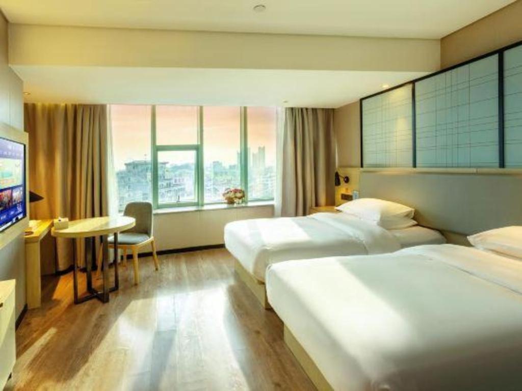 Echarm Hotel Yangjiang Baili Plaza Exterior foto