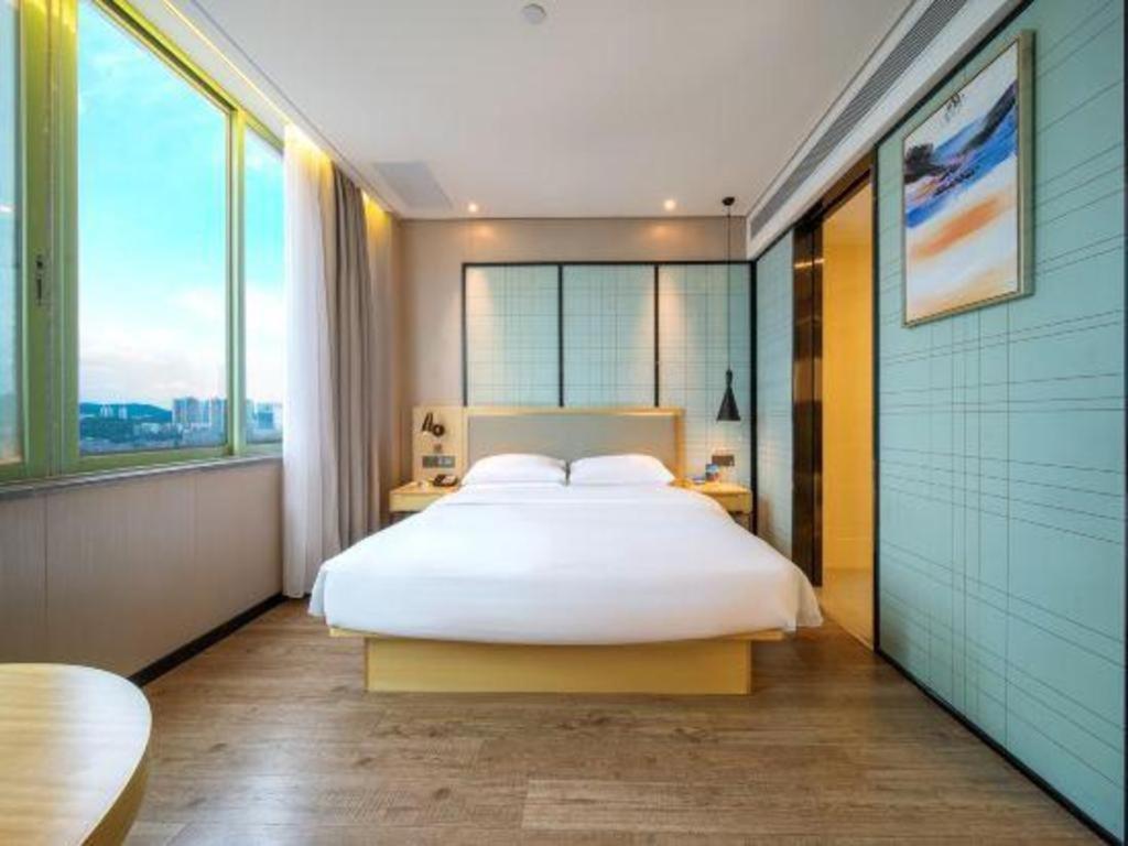 Echarm Hotel Yangjiang Baili Plaza Exterior foto