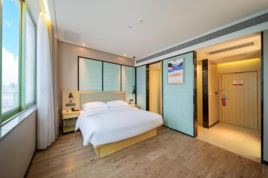 Echarm Hotel Yangjiang Baili Plaza Exterior foto