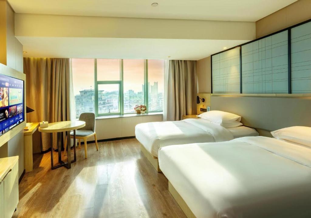 Echarm Hotel Yangjiang Baili Plaza Exterior foto